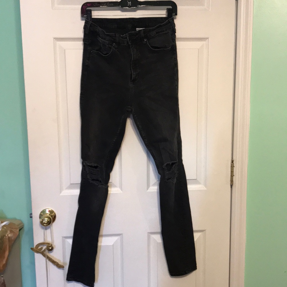 High-waisted black denim ripped jeans (H&M)